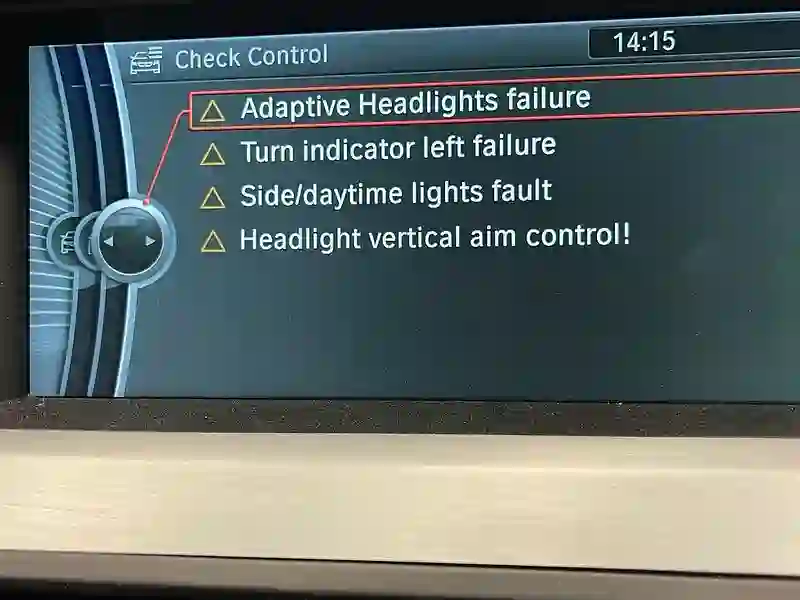 A car diagnostics screen showing faults being read at M&S Garage